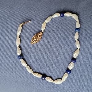 Fresh water pearl and lapis bead bracelet.